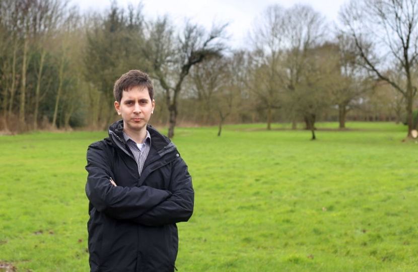 Westlands Conservative Councillor Mark Holland campaigning to save green spaces.